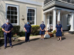 Staff wearing visors at Primley House, Paignton