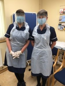 Staff wearing visors at St Levan Surgery, Plymouth